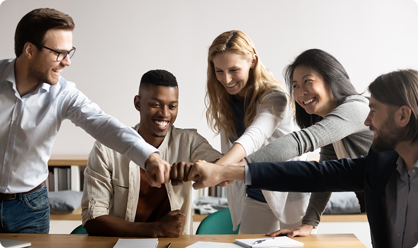 Image representing a group of young business people working hand in hand to ensure proper ethics in the workplace